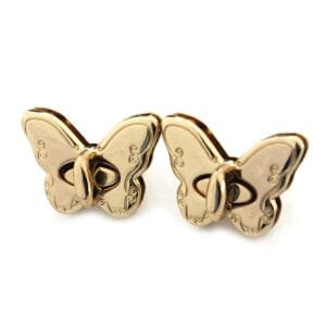 Serrure tournante en métal en forme de papillon